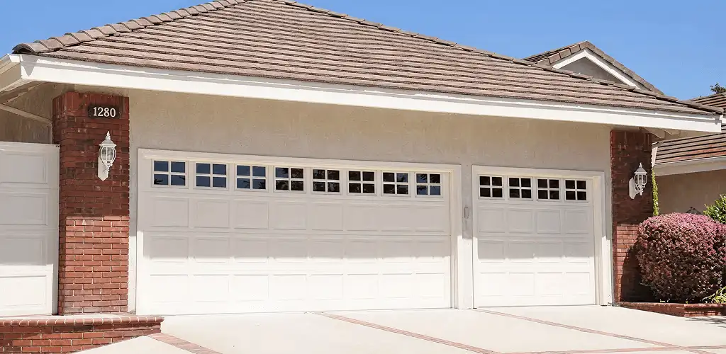 Residential garage door repair service for a double garage door in Charleston, SC