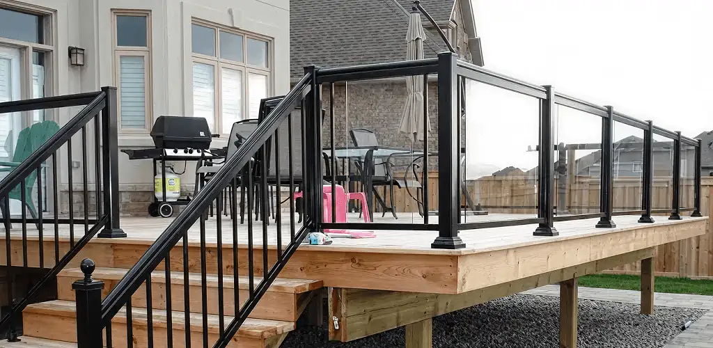 Handrail installation on a deck staircase for safety and code compliance in Charleston, SC