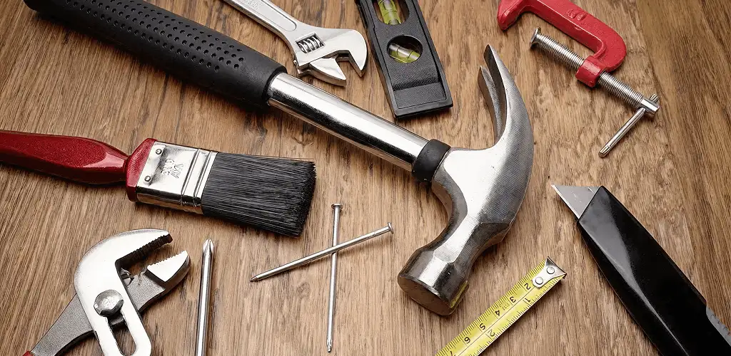 Handyman tools laid out for home repair and maintenance work in Charleston, SC